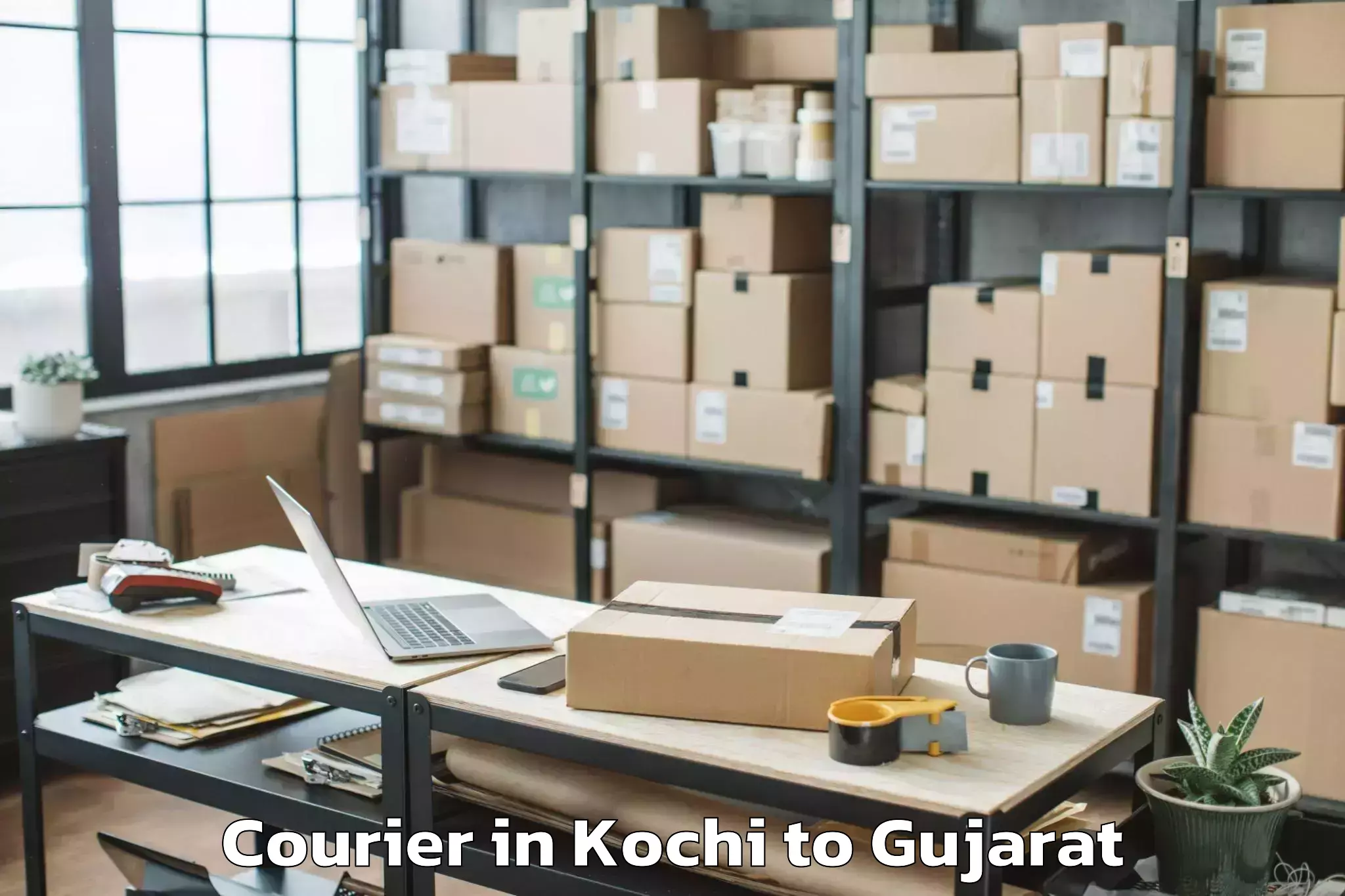 Book Kochi to Thasra Courier